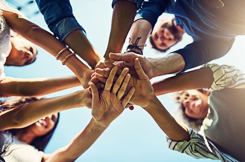 Group of Students having Handshake